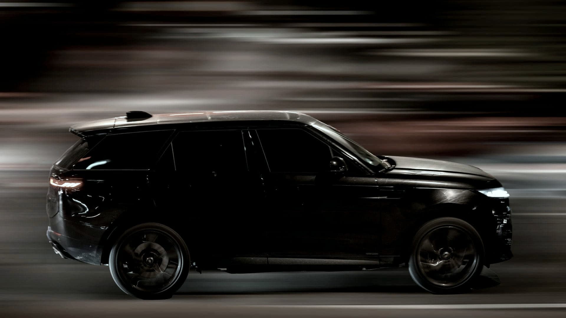 Black SUV on a Houston street at night